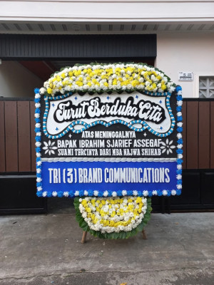 Papan Bunga Duka di Juai